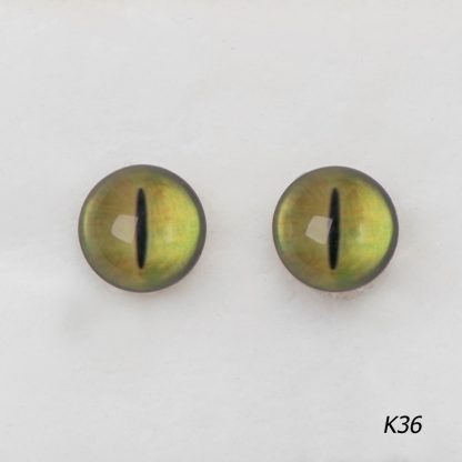 Стеклянные, кошачьи глазки зеленого-желтого цвета